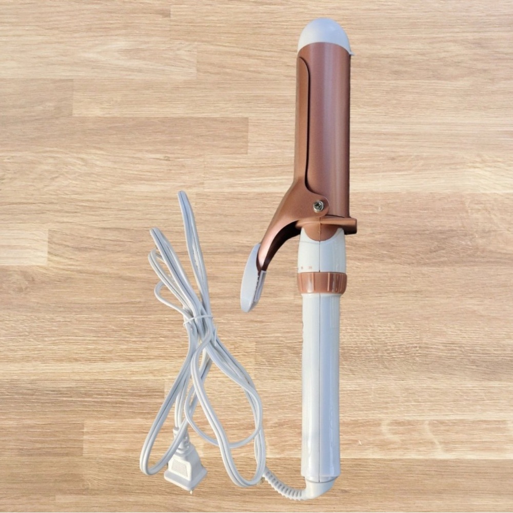 Gold and White Hair Styling Tool